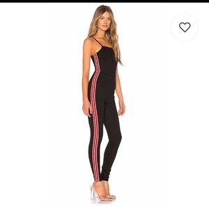 by the way. MILEY SPORT STRIPE CAT SUIT IN BLACK